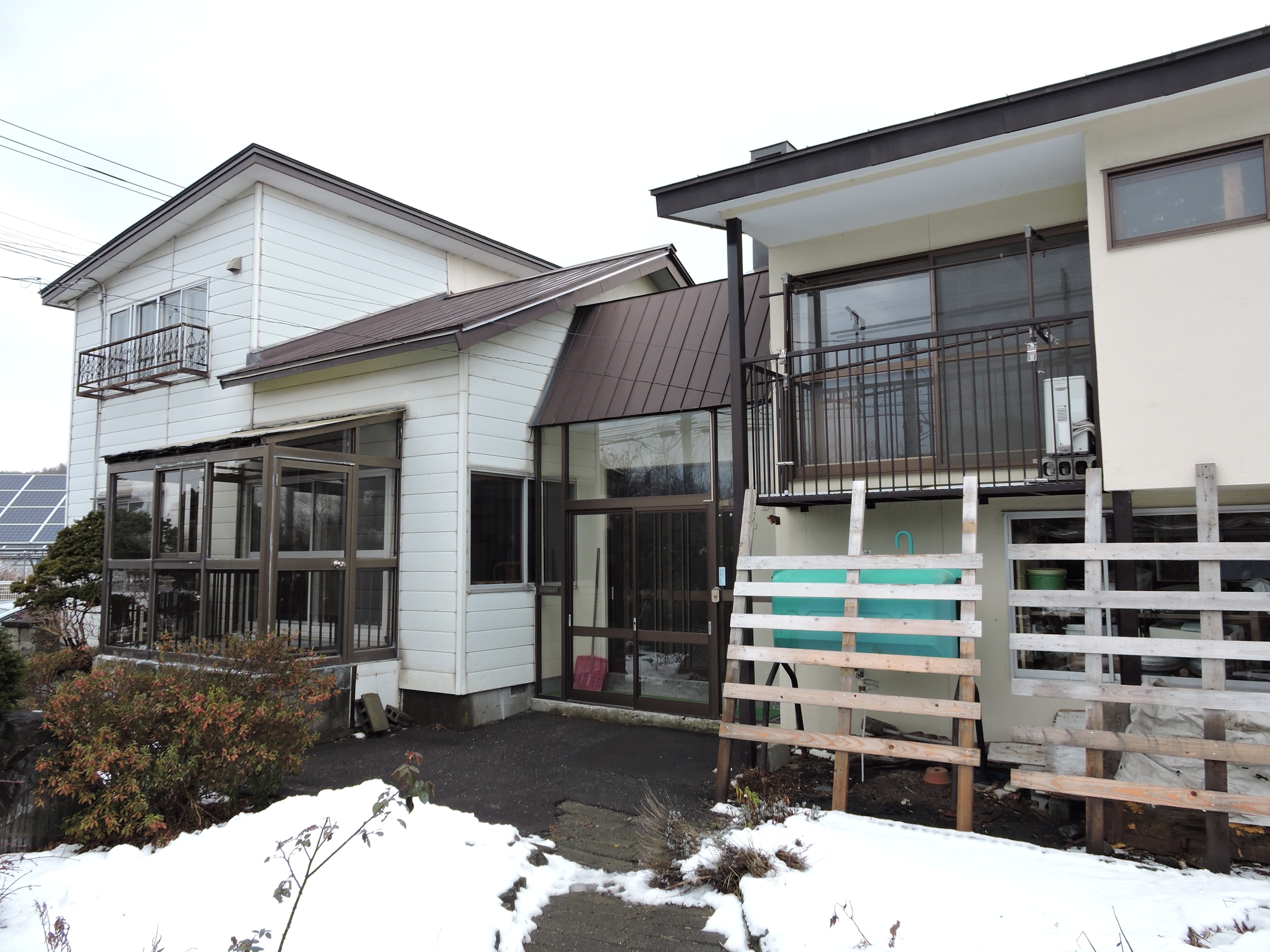 大きなサンルームが魅力の明るい住まい